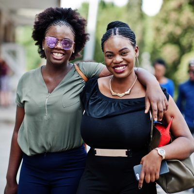 two-african-american-girls-walking-posed-street-city